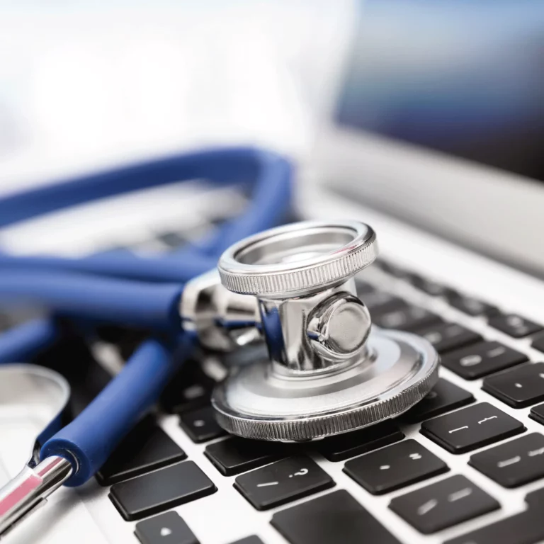 stethoscope on a keyboard to symbolise health and safety